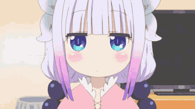 a little girl with white hair and blue eyes