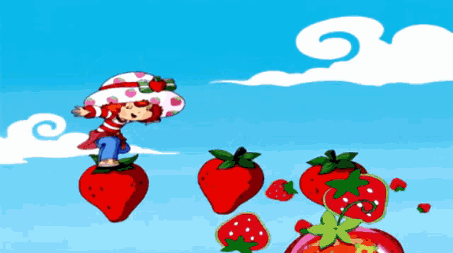 a cartoon of strawberry shortcake standing on top of strawberries