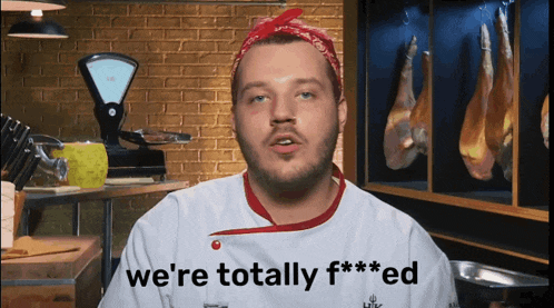 a chef says we 're totally f *** ed in front of a brick wall