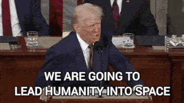 a man in a suit and tie stands at a podium with the words we are going to lead humanity into space below him