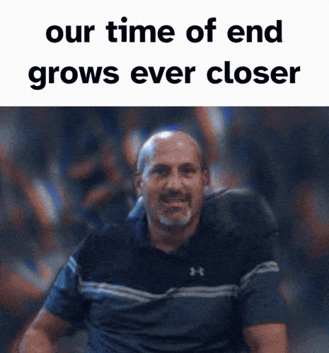 a man in a under armour shirt is smiling with the words " our time of end grows ever closer " above him