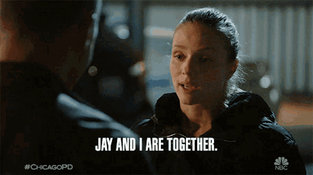 a woman says jay and i are together while talking to a police officer