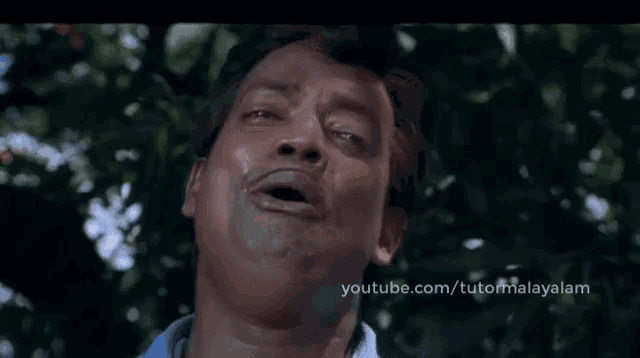 a close up of a man 's face with the words oh my god above him