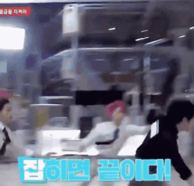 a group of people are standing around a table with a sign that says ' i 'm sorry ' on it