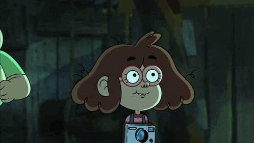 a close up of a cartoon character 's face with big eyes