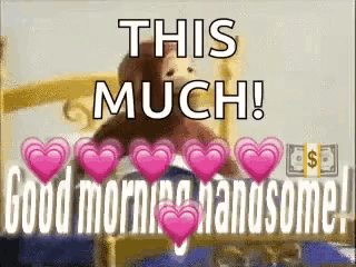 a teddy bear is sitting on a bed with hearts around it and the words this much good morning handsome