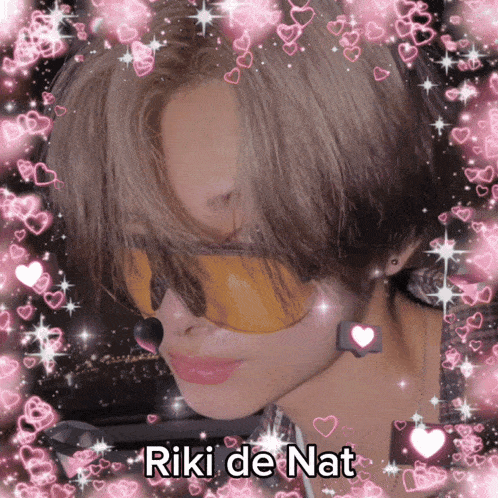 a picture of a girl wearing sunglasses with the name riki de nat on it
