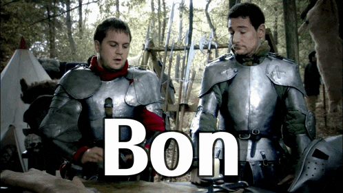 two men in armor are standing next to each other and the word bon is on the screen