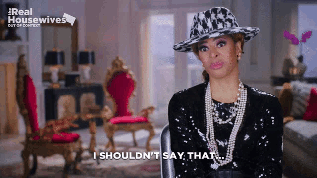 a woman in a hat and pearls says i should n't say that