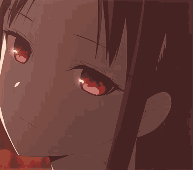 a close up of a girl 's red eyes