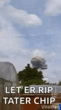 a large explosion in the sky with the words `` let er rip tater chip '' written on the bottom .
