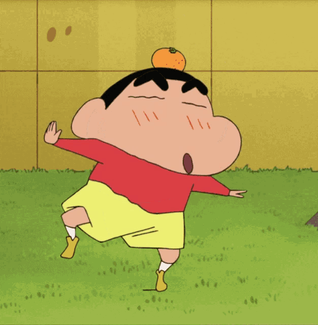 a cartoon character holding an orange in his hands