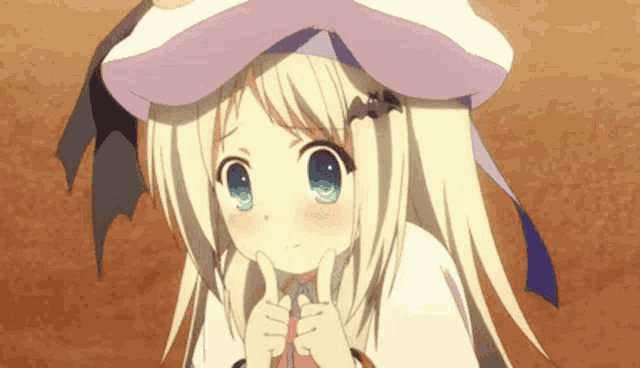 a little girl with blonde hair and blue eyes is wearing a white hat