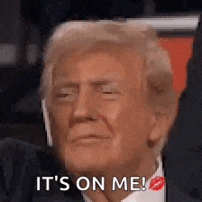 a close up of donald trump 's face with the words `` it 's on me '' .