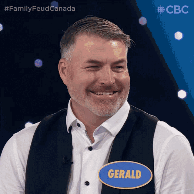 a man with a name tag that says " gerald " on it