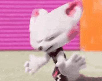 a white cartoon character is standing in front of a pink wall and making a funny face .
