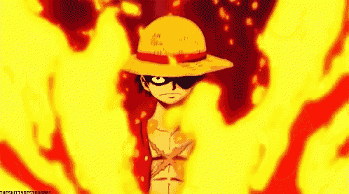 monkey d luffy from one piece is surrounded by fire .