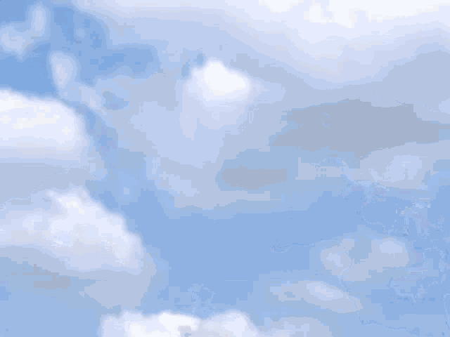 a cartoon character is standing in front of a cloudy sky