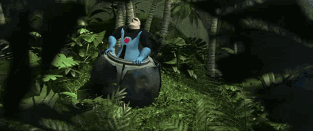 a man in a blue superhero costume with the letter i on his chest