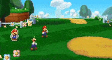 mario and luigi are playing a video game in a grassy field .