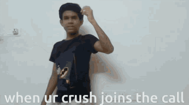 a young man wearing a batman shirt says when ur crush joins the call ..