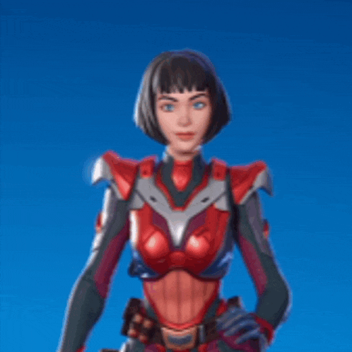 a woman is standing in front of a blue background wearing a red and gray armor .
