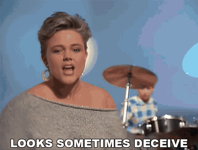 Looks Sometimes Deceive The Go Gos GIF - Looks Sometimes Deceive The Go Gos Head Over Heels GIFs