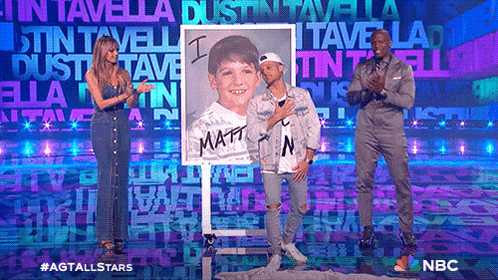a group of people standing in front of a sign that says i matt on it