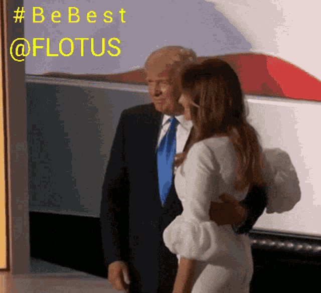 a man in a suit and tie is standing next to a woman in a white dress with the words #bebest @flotus above them