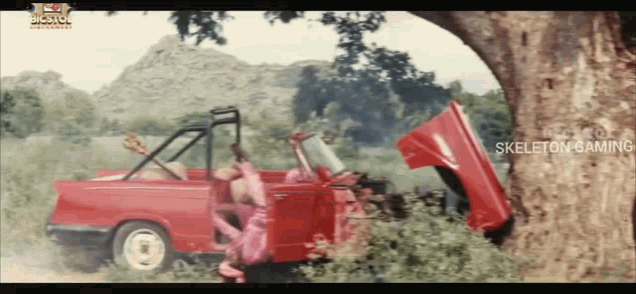 a red car with the hood open and the words skeleton gaming on the bottom right