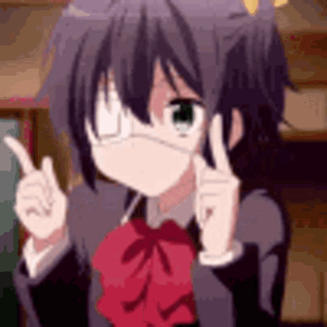 a girl in a school uniform is wearing a mask and pointing at something .