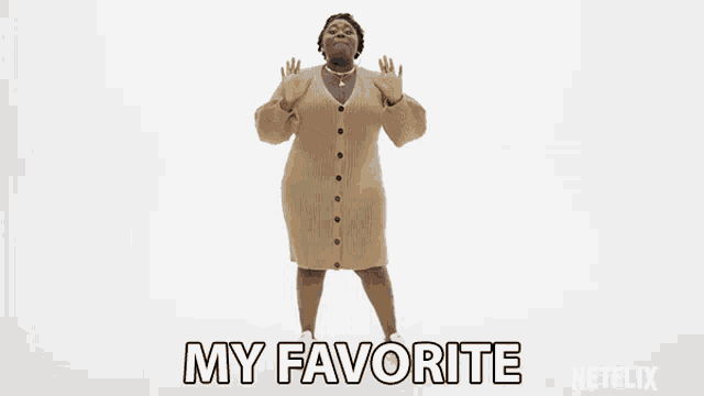 a woman in a sweater dress is dancing and says my favorite