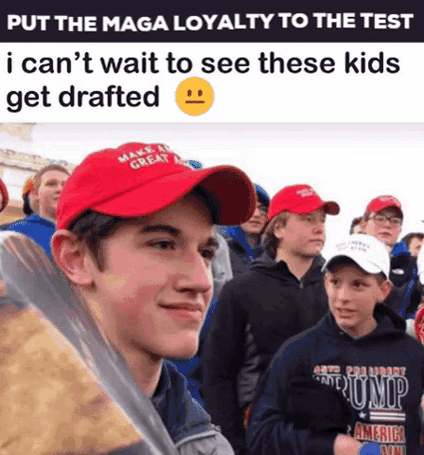 a boy wearing a maga hat holds a baseball bat