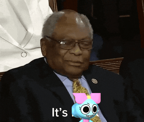 a man in a suit and tie with a stuffed animal that says it 's on it