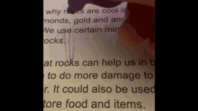 someone is writing on a piece of paper that says " why rocks are cool "