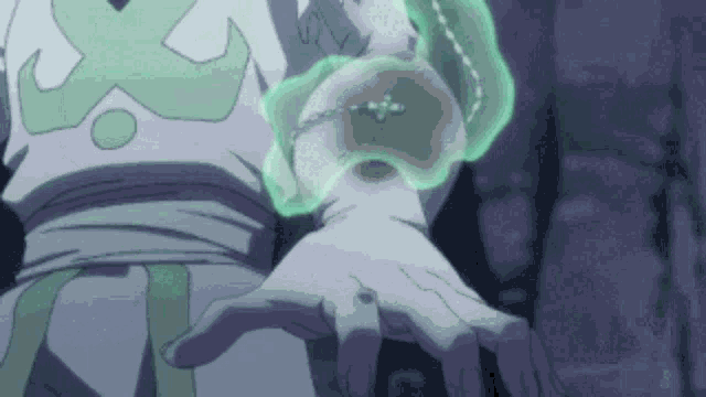 a person with a green bracelet on their arm