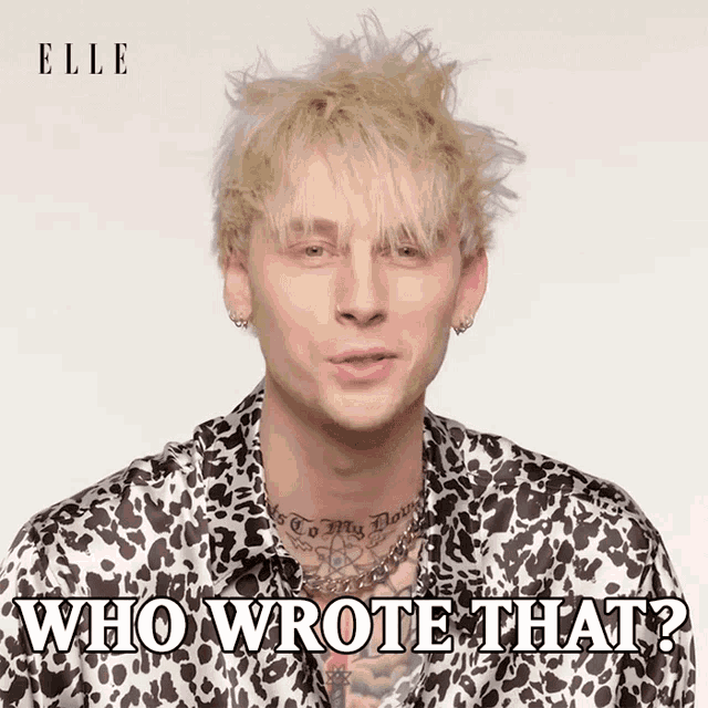a man wearing a leopard print shirt is asking who wrote that