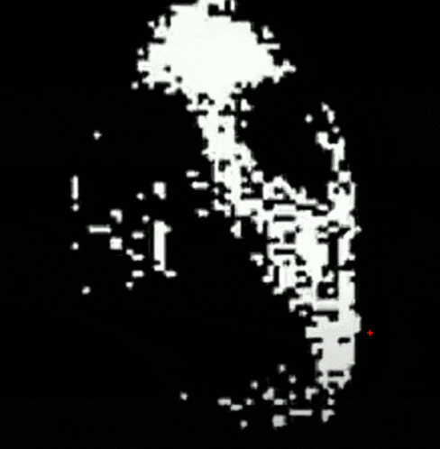 a black background with white dots and a red circle in the middle