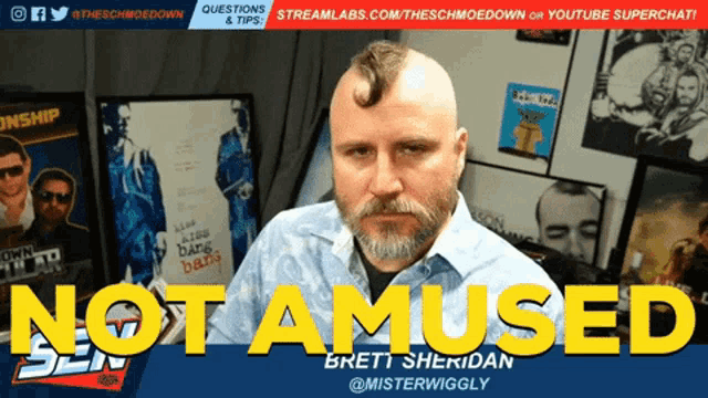 a man with a mohawk says not amused