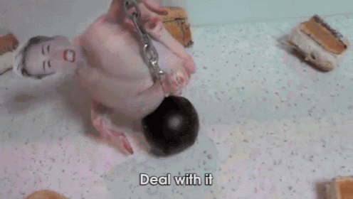 a naked man is chained to a ball with the words deal with it below him