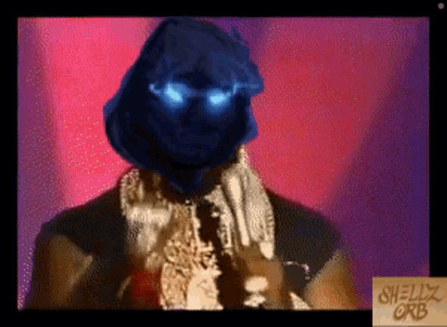 a pixelated image of a man with blue eyes and the words shelly orb below him