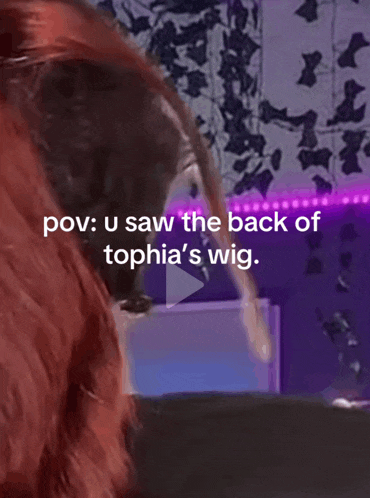 a video of a person wearing a wig with the caption " pov u saw the back of tophia 's wig "