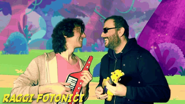 two men holding guitars with the words raggi fotonici written on the bottom
