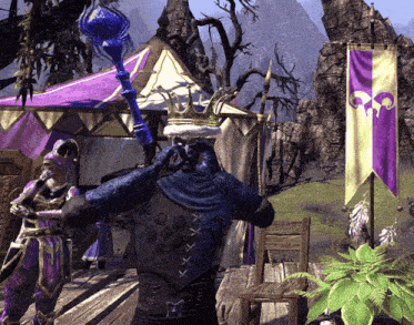 a man with a crown on his head is standing in front of a purple tent