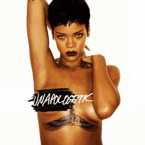 a naked woman with a tattoo on her chest has the word unapologetic written on her chest