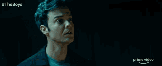 a man in a dark room says " cool "