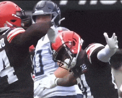 a football player with the number 18 on his back