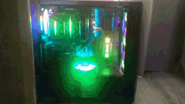 a computer case with a green light coming out of the top