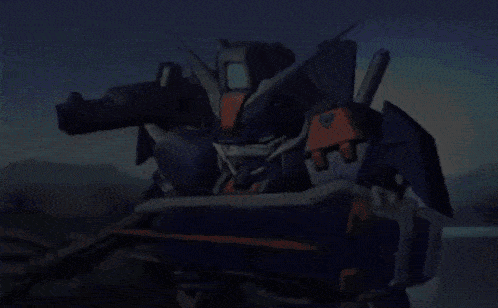 a blue and orange robot with a triangle on it