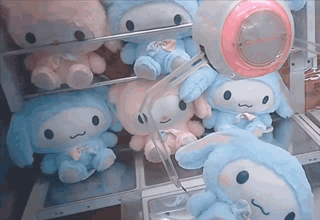 a bunch of stuffed animals are sitting on a table